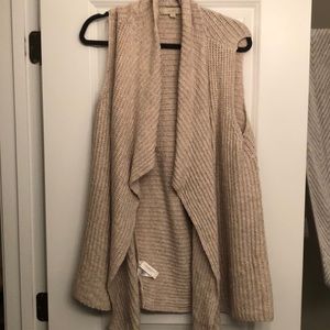 Sleeveless Loft cardigan.